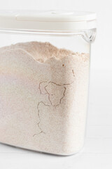 Path of meal moths in a jar of flour, vertical view
