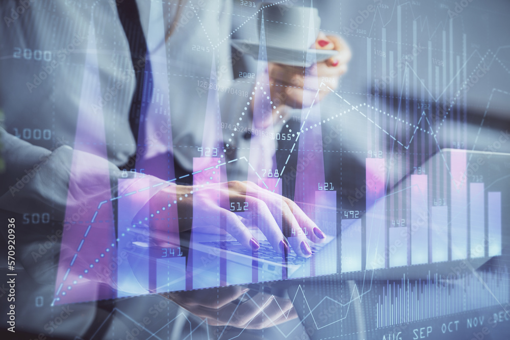 Poster double exposure of businesswoman hands typing on computer and financial graph hologram drawing. stoc