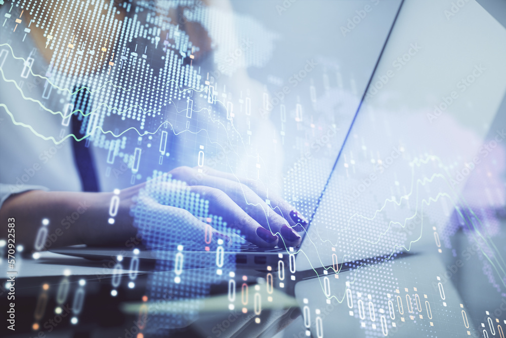 Poster double exposure of woman hands typing on computer and financial graph hologram drawing. stock market