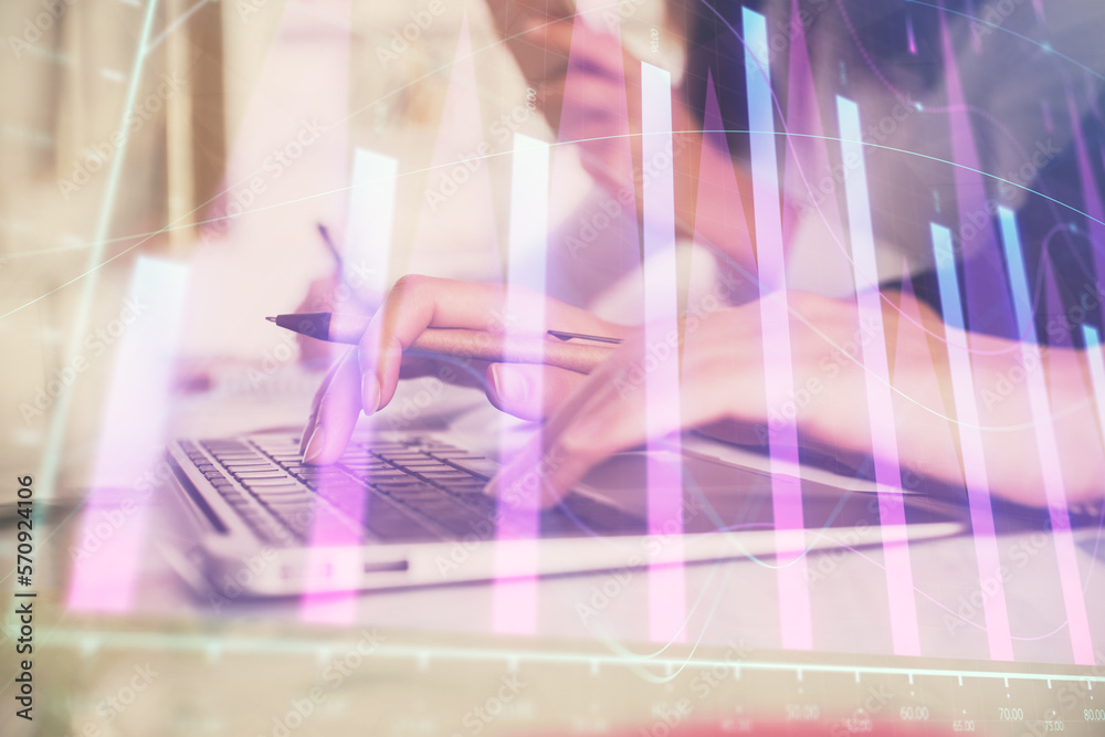Poster multi exposure of woman hands typing on computer and financial graph hologram drawing. stock market 