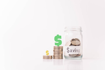 Pile of money coins in piggy bank with white background, saving money and financial concept, financial growth, copy space