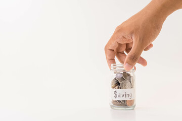 hand picking up a piggy bank with white background, saving money and financial concept, investment idea, copy space