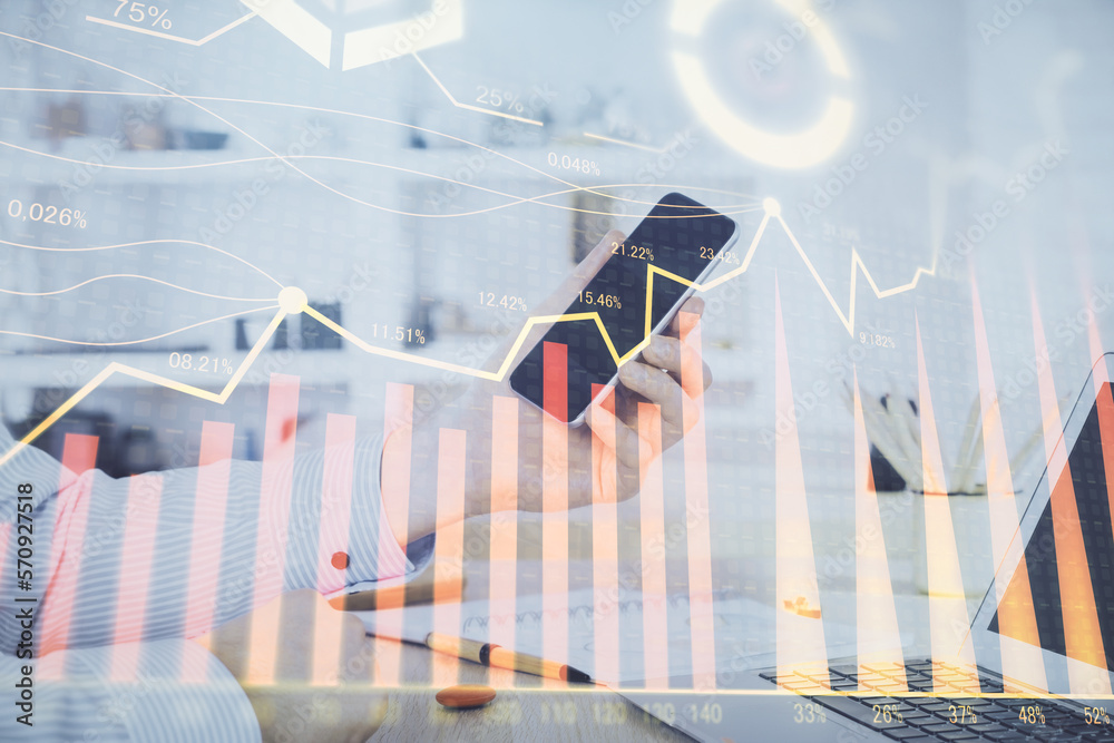 Poster double exposure of man's hands holding and using a digital device and forex graph drawing. financial