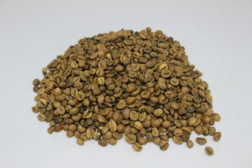 portrait of raw coffee beans with white background