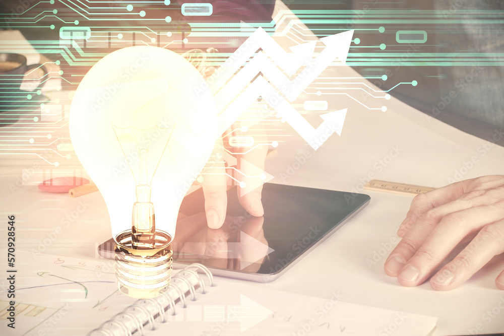 Poster Double exposure of man's hands holding and using a digital device and bulb hologram drawing. Idea concept.