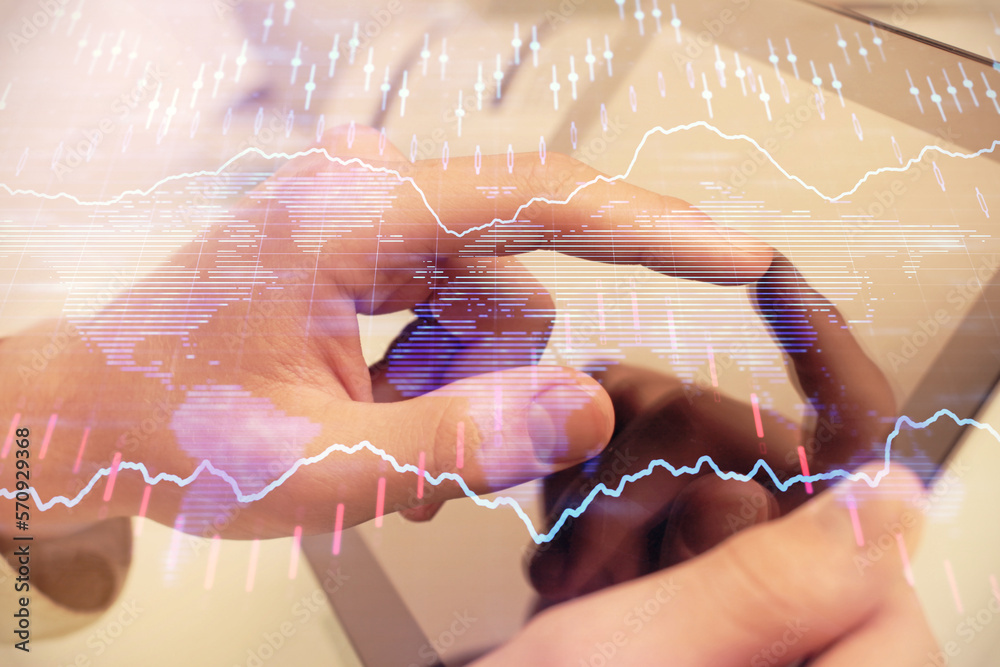 Poster multi exposure of man's hands holding and using a phone and financial chart drawing. market analysis