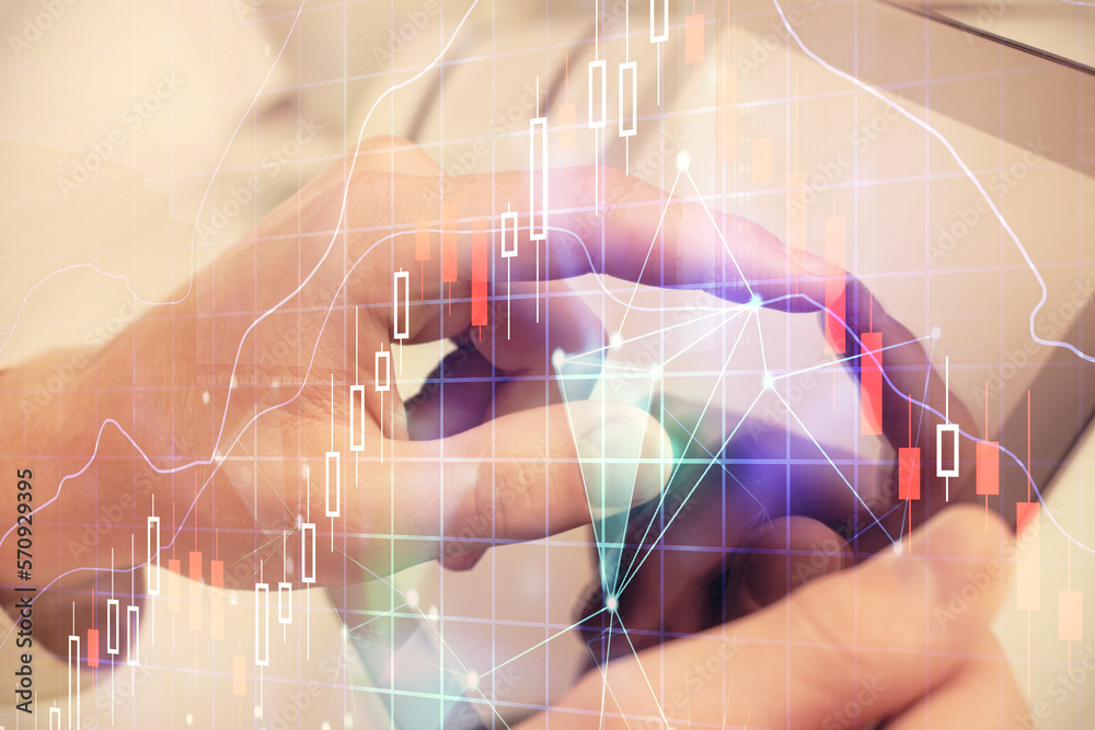 Poster multi exposure of man's hands holding and using a phone and financial chart drawing. market analysis