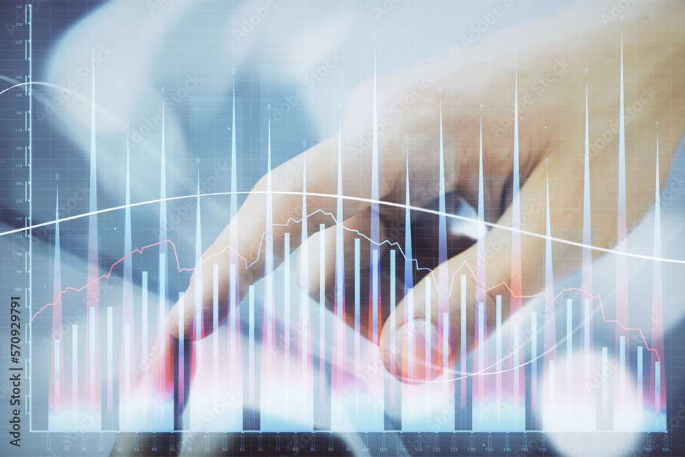 Poster multi exposure of man's hands holding and using a phone and financial chart drawing. market analysis