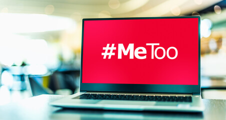 Laptop computer displaying the sign of MeToo movement