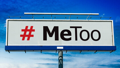 Advertisement billboard displaying the sign of MeToo movement