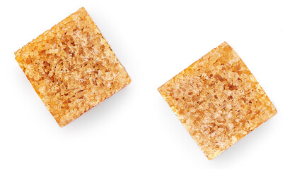 Pieces of cane sugar isolate on white background. Thatched brown sugar cube set Top view. Flat lay.