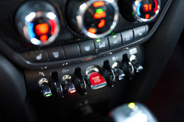Closeup of buttons, knobs and switches in a car soft focus - 570932183