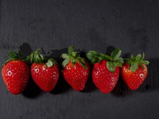 trawberries isolated on black background