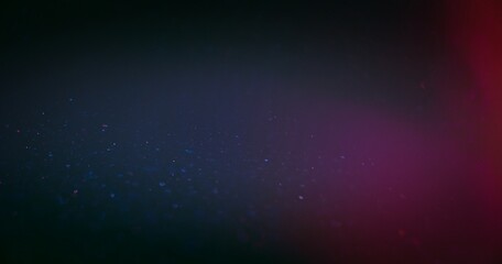 Defocused glow overlay. Light flare. Bokeh radiance. Blur neon blue pink color gradient glare glitter texture dark abstract copy space background.