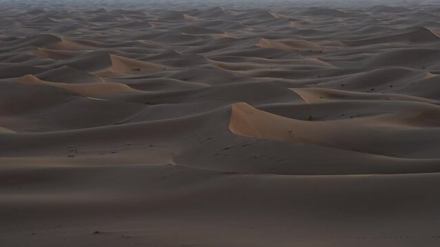 Sea of Erg Chigaga dune in Sahara desert in african southeastern MOROCCO, clear blue sky in 2023 warm sunny winter day on January.