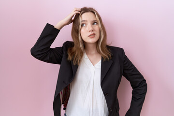 Young caucasian business woman wearing black jacket confuse and wondering about question. uncertain...