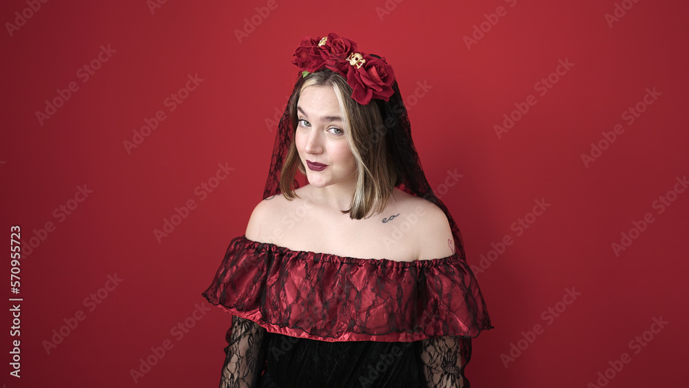 Sticker Young blonde woman wearing katrina costume smiling confident over isolated red background