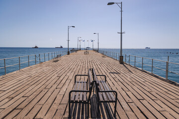 Tourists pier in Molos sea front park of Limassol city in Cyprus island country