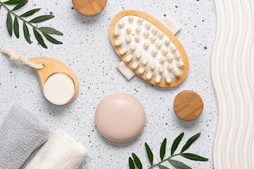Obraz na płótnie Canvas Spa and wellness concept. Set of eco friendly spa tools, towels, brushes, natural soap and creams on white marble background top view. 