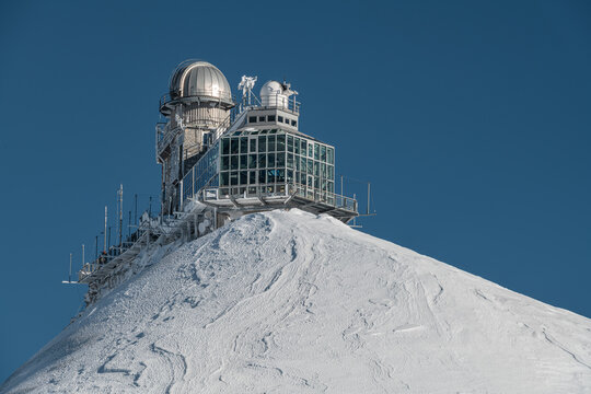 View of the Sphinx Observatory on Jungfraujoch, one of the highest observatories in the world located at the Jungfrau railway station, Bernese Oberland, Switzerland. Travel and tourism concept.