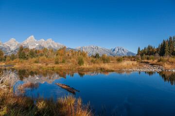 Fototapeta na wymiar Scenic Autumn Reflection Landscape in Grand Teton National Park Wyoming