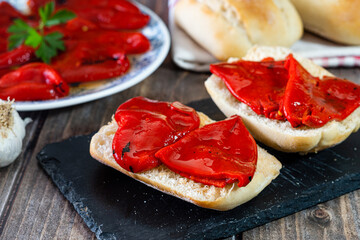 Piquillo peppers roasted in the oven, with bread.