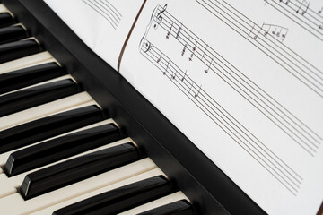 Musical keyboard and handwritten sheet music