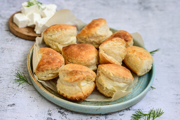 Fresh baked home made  Mini cheese puff pastries.Cheese pie with phyllo pastry and herbs