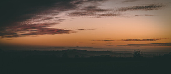 Fototapeta na wymiar Sunset with cloudy skies