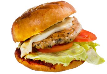 Burger with grilled chicken meat, tomato and melted cheese . Juicy chicken in a grilled burger