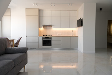 Modern Contemporary kitchen room interior .white and wood material. real new interior design
