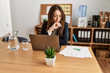 Young hispanic woman business worker using laptop working at office