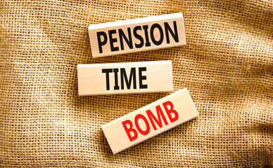 Pension time bomb symbol. Concept words Pension time bomb on wooden blocks on a beautiful canvas table canvas background. Business pension time bomb concept. Copy space.