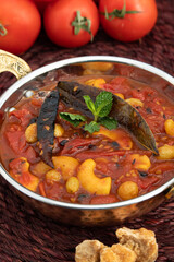 Bengali Style Sweet Sour And Spicy Tomato Chutney Also Called Tamatar Ki Khatti Meethi Chatney Or Chutni Bhoger Prasad Prepared Primarily From Fresh Tomatoes, Dry Fruits And Spiced With Garam Masala