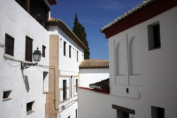 Fototapeta na wymiar Views of the narrow streets in the San Pedro and east part of El Abaicin districts - Granada - Andalusia - Spain