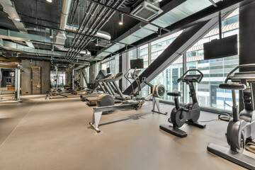 Modern gym with training equipment