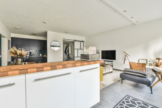 Spacious living room with yellow sofa