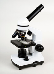 Microscope close-up. Examination of a micro sample on a glass slide. Animation for use in science and medicine.