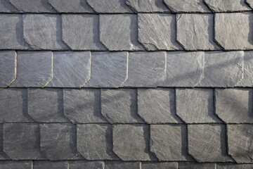 historic slate tiles outside a house background