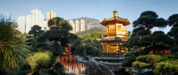 Buddhist temple in Hong Kong with skyscrapers in the background