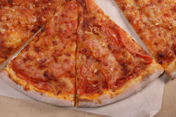 Fresh sliced margarita pizza closeup