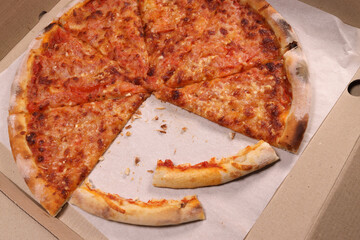 pizza scraps in a delivery box