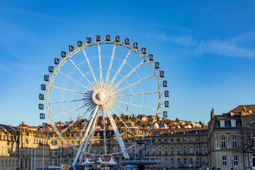 Ferris wheel in Stuttgart city in front of the new castle in operation