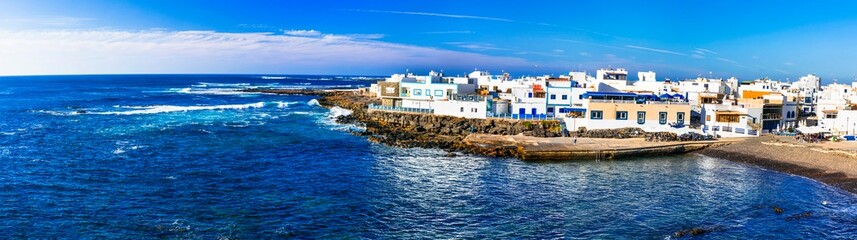Fototapeta na wymiar Scenic colorful traditional villages of Fuerteventura - El Cotillo in northen part of island. Canary islands of Spain