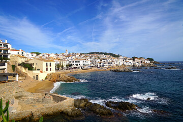 view to the beaches and coast in Calella de Palafrugell, where the historic houses rise to the sea,...