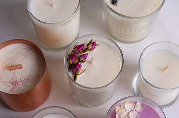 Obraz na płótnie Canvas Soy Candles, Assorted Handmade Scented Candles in Glass