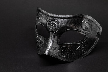 silver and black face mask