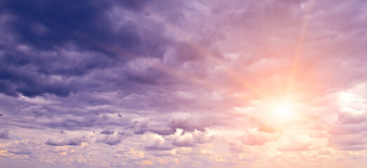 Naklejka na ściany i meble Bright majestic dawn against stormy sky.