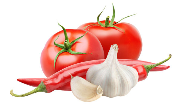 Fresh tomatoes, garlic and chili pepper (arabbiata souce ingredients) cut out