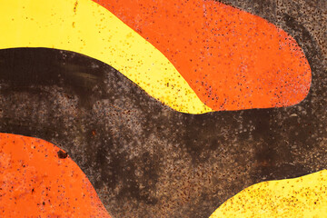 Color rusty abstract painted metal background. Yellow black and orange texture of old plate